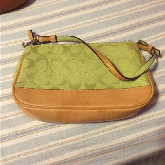Coach lime green and tan shoulder bag.