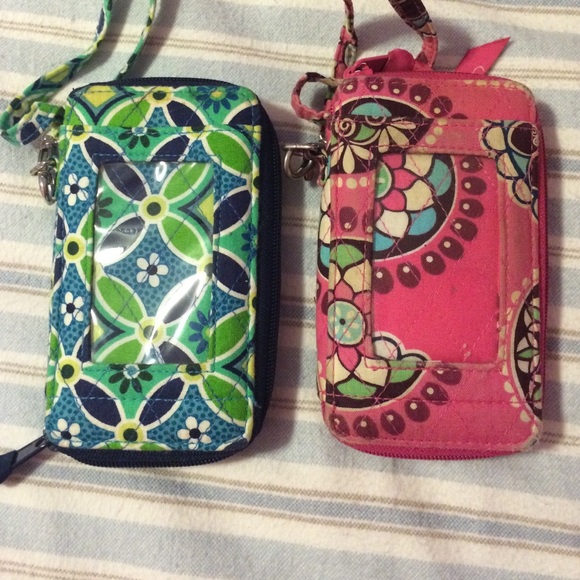 Two Vera Bradley 3 in 1 wristlets.