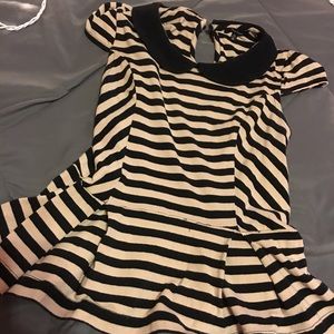 Light pink/nude and black peplum shirt