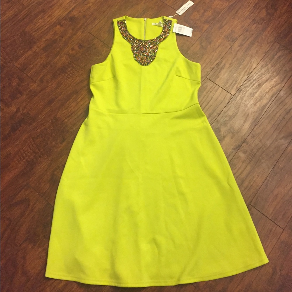 Spenser dress. Very unique. Beautiful beaded neck