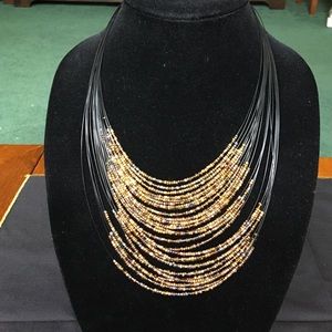 Multi layered seed bead necklace.