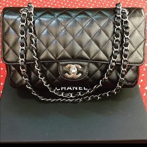 Authentic Chanel used  classic black caviar