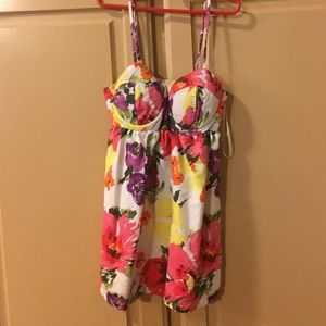 Floral spaghetti strap top with fully lined cups