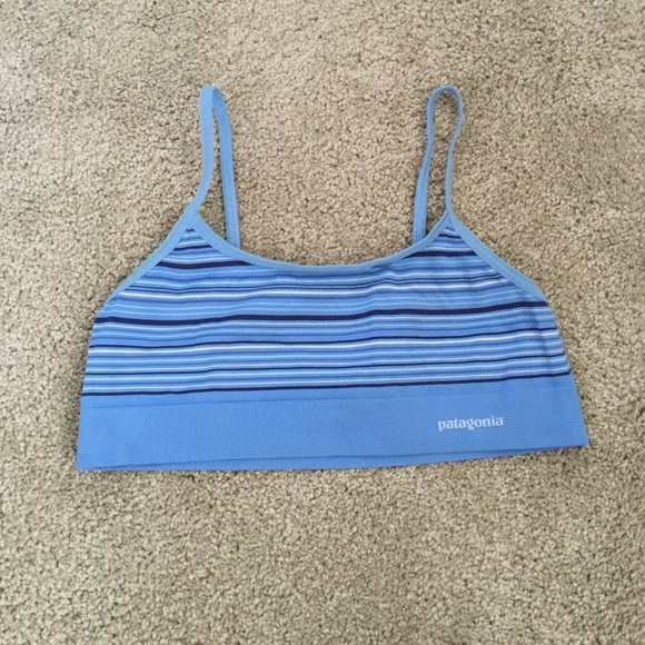 blue, black, and white striped sports bra