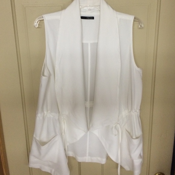 White Vest with drawstring and pockets.