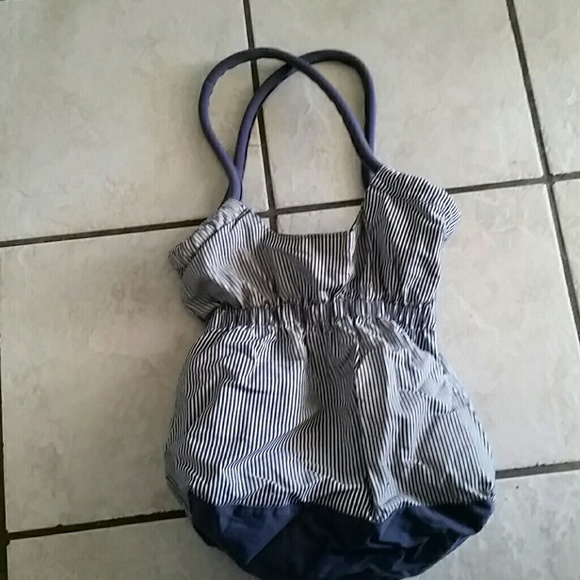 A blue and white striped shoulder bag