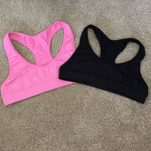 pink sports bra and black sports bra