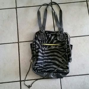 A black and silver shoulder bag