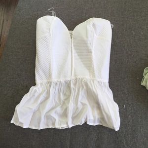 LuLu's white bustier style top.
