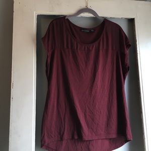 Cute wine shirt with sheer top flare!