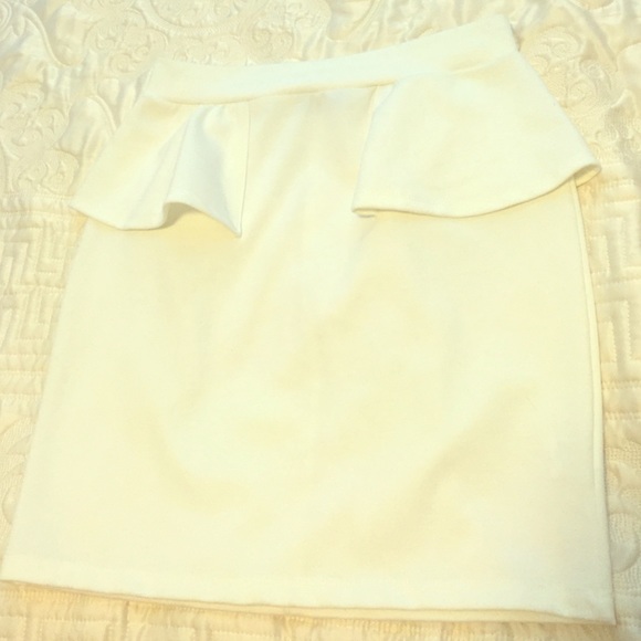 Cream colored skirt. Only worn once. Like new
