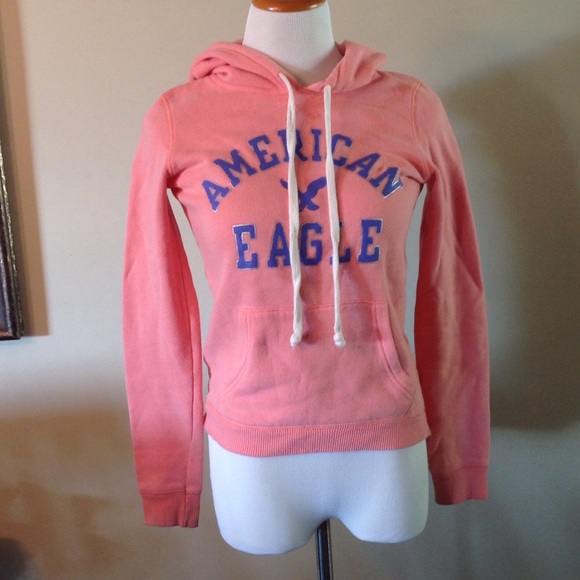 Salmon color and purple lettering sweatshirt