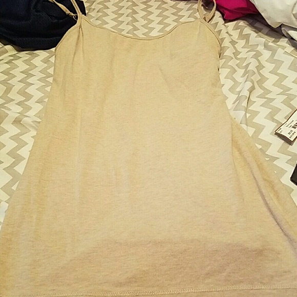 Tank top says xl will fit lg too