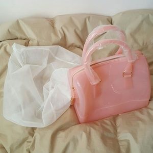 Brand New without tag, light pink silicone satchel
