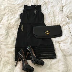 SOLD! - locally Bebe black trim dress-Sale! $40.00