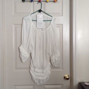 White layered blouse with matching pants