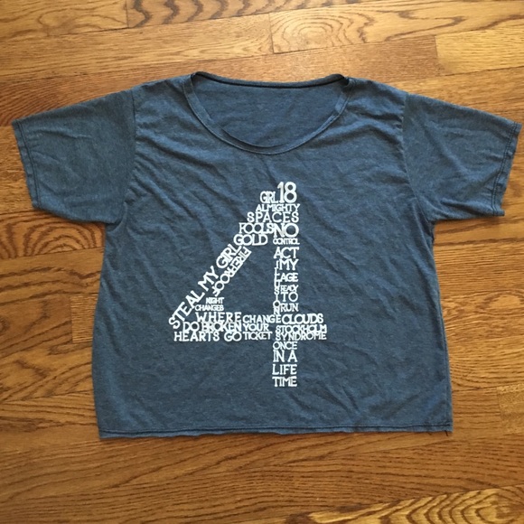 One Direction shirt with the song titles