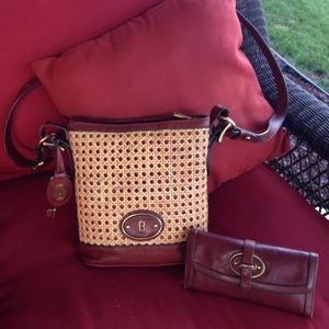 A Fossil purse and a Fossil wallet.