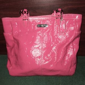 Large pink leather Coach handbag.