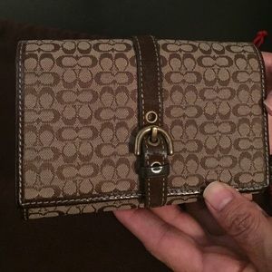 Coach dark wallet with print
