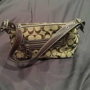 Authentic Coach small purse with signature fabric
