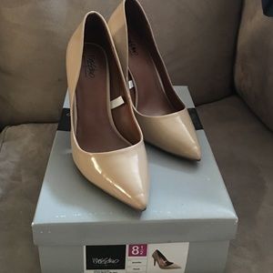 Tan pointy heels