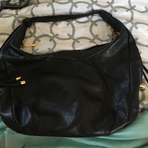 Black and gold purse w/ pretty red flower pattern