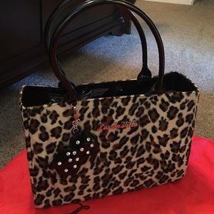 Lux de Ville leopard handbag