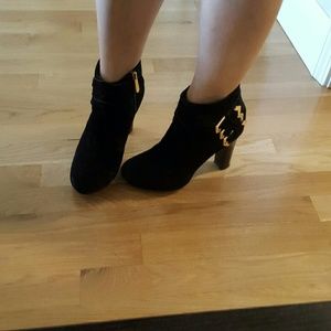 Guess Black suede booties with gold buckles