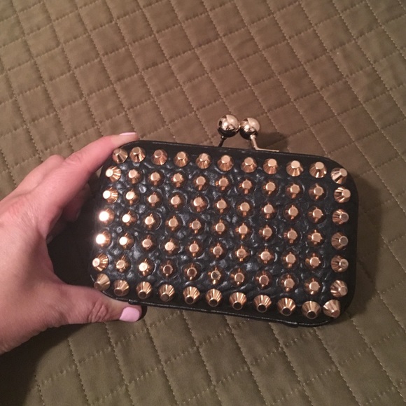 Gold studded clutch