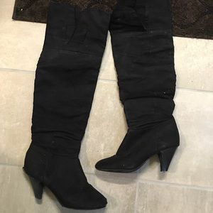 Tall black boot heels