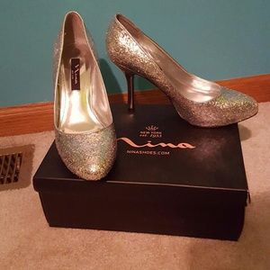 Heels. Glittery. I only wore then one time.