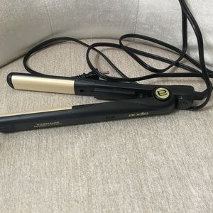 Andis hair iron curl or straighten