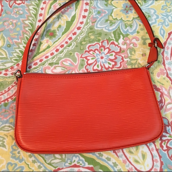 Louis Vuitton  small leather bag.