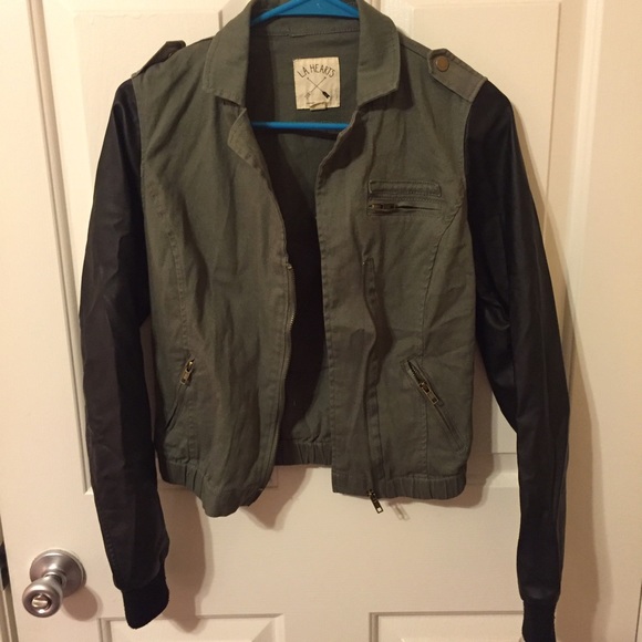 Green jacket with leather sleeves