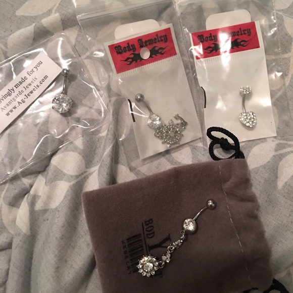 4 brand new belly rings