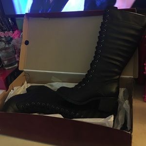 Long black lace/zip up boots.