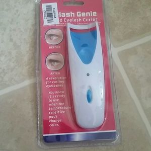 Heated eyelash curler