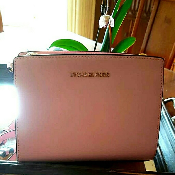Michael Korn blush colored purse