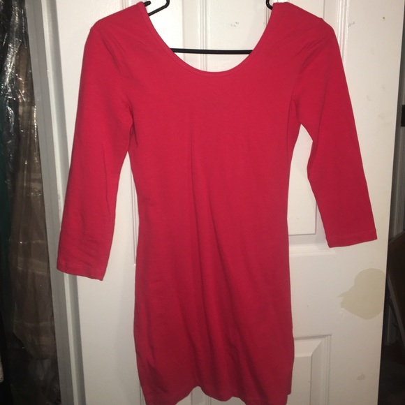 Tight fitted, coral, three quarter sleeved dress