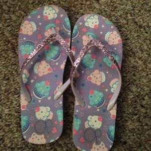 OP purple flip flops