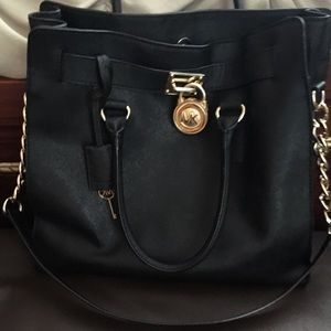 MK black hamilton with gold accents