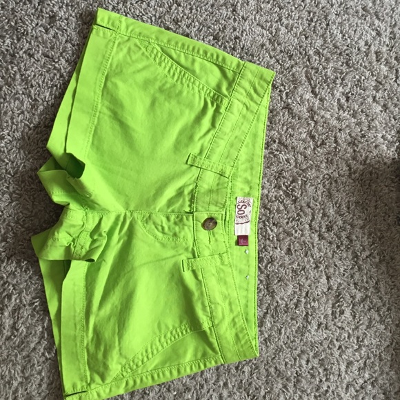 Green shorts. Brand new. Front and back pockets