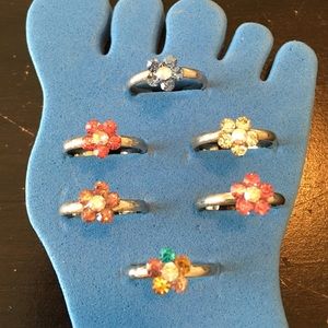 6 Toe rings. Flower Design color stones