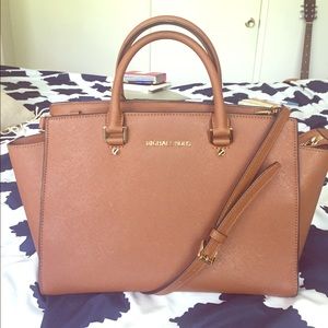 Large Selma Michael Kors purse. Luggage color.