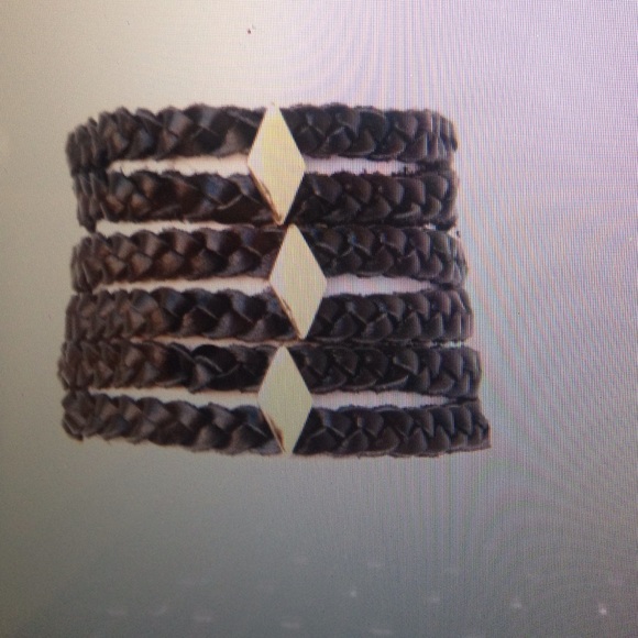 Black leather bracelet with gold studs