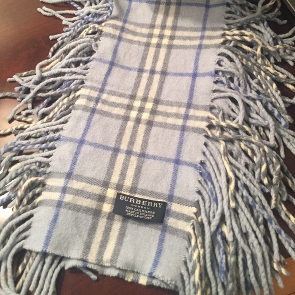Blue Burberry cashmere fringe scarf.