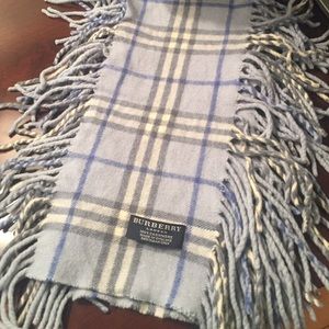 Blue Burberry cashmere fringe scarf.