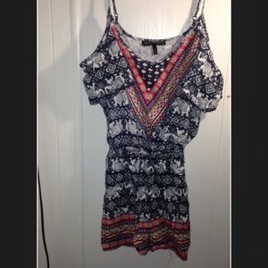 Navy blue romper with elephant pattern