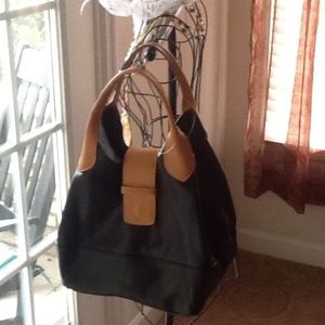 Black Leather handbag (MAURIZIO TAIUTI )